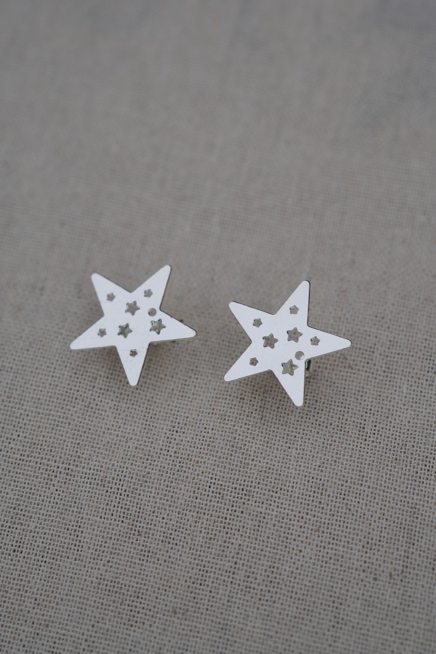 Aros Silver estrellas caladas