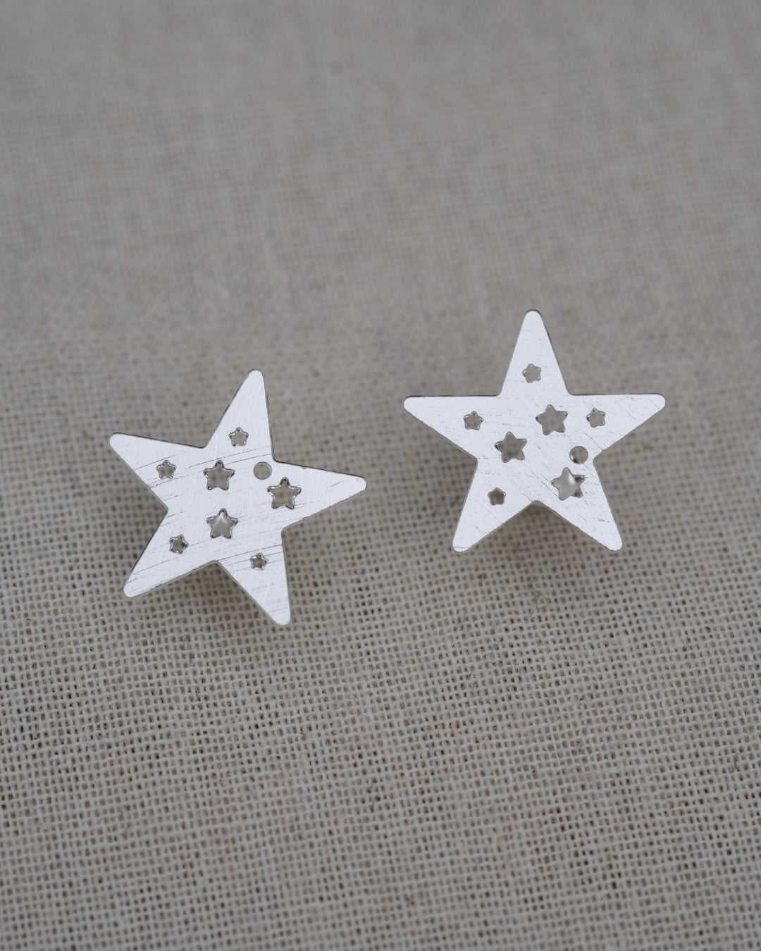 Aros Silver estrellas caladas