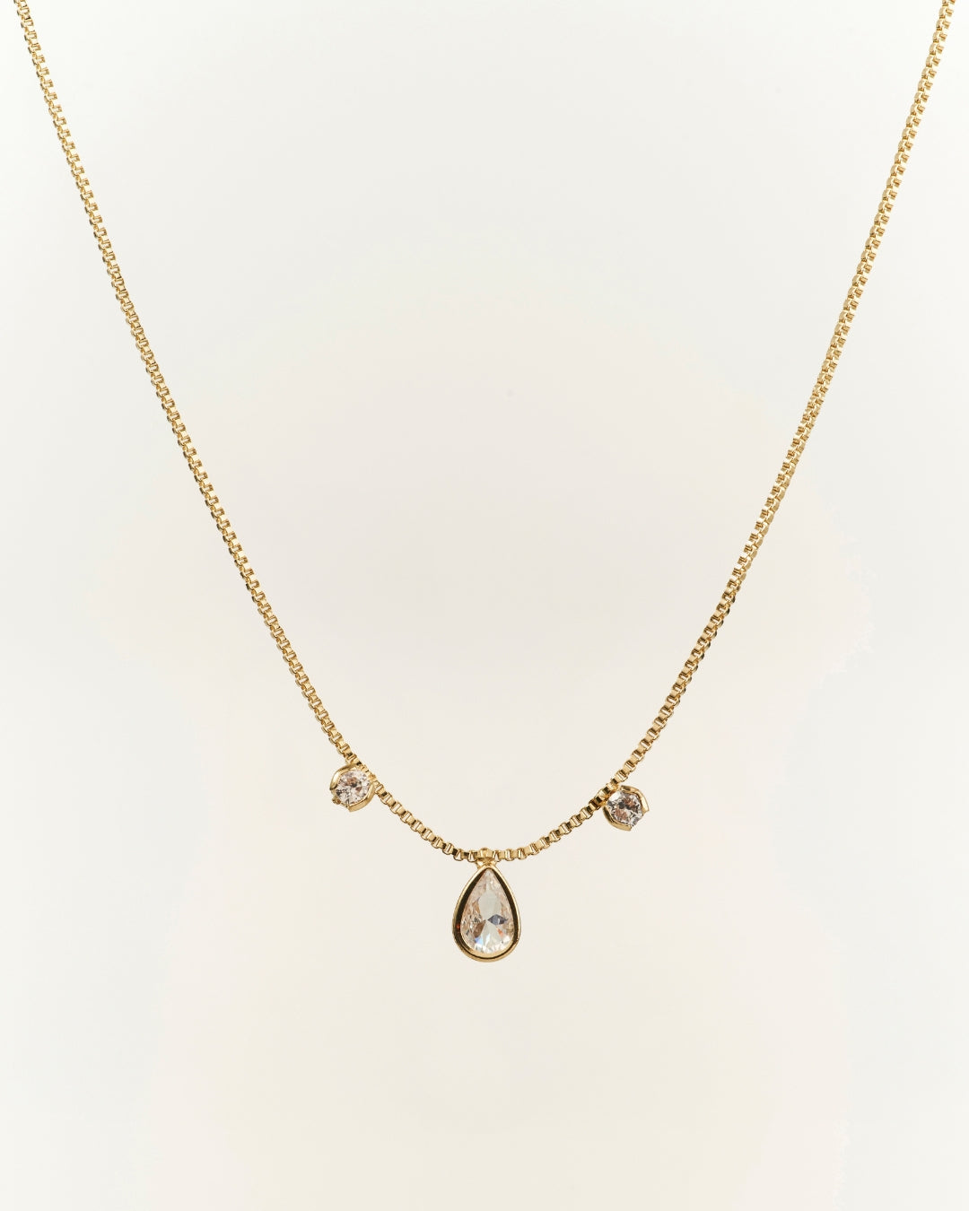 Punto de luz Gota y mini circones Gold