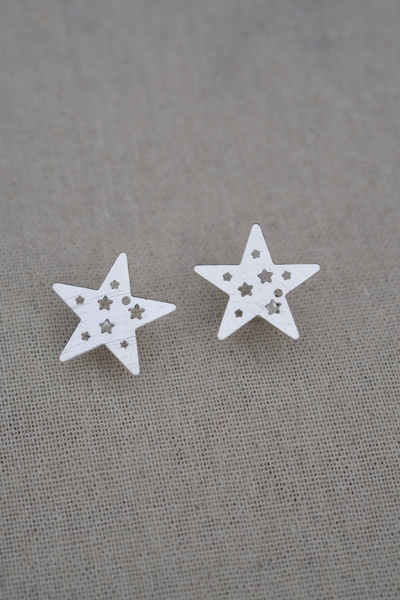 Aros Silver estrellas caladas