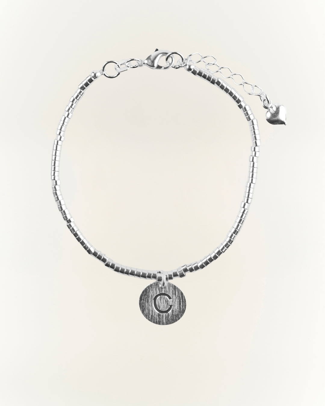 PULSERA SILVER MOSTACILLA TUBO LETRA