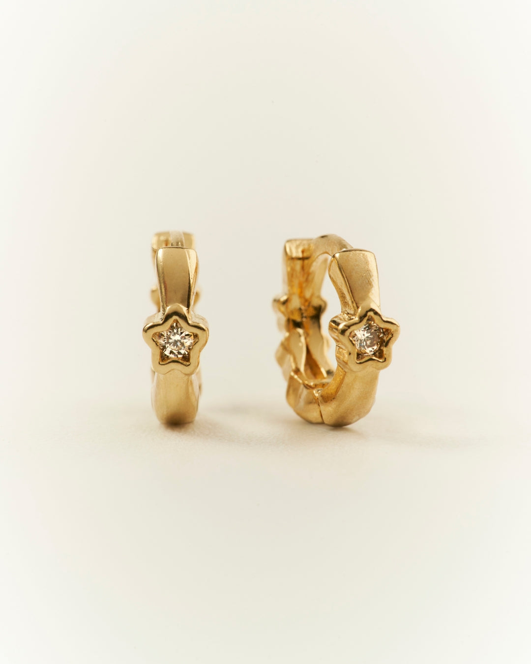 Aros gold estrella circón