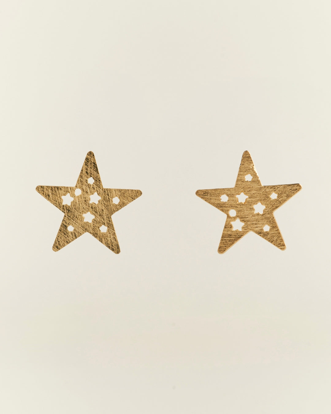 Aros gold estrellas Caladas