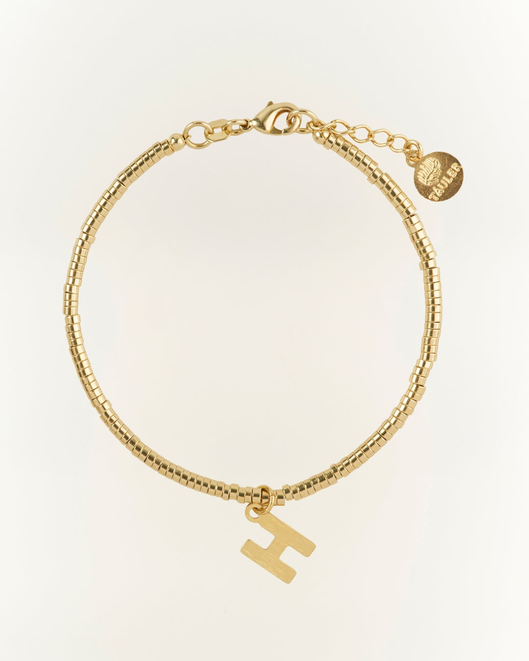 PULSERA GOLD MOSTACILLA TUBO LETRA